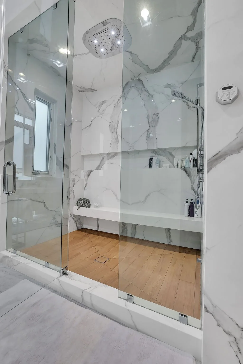 Wieuca Rd — Marble-tiled shower